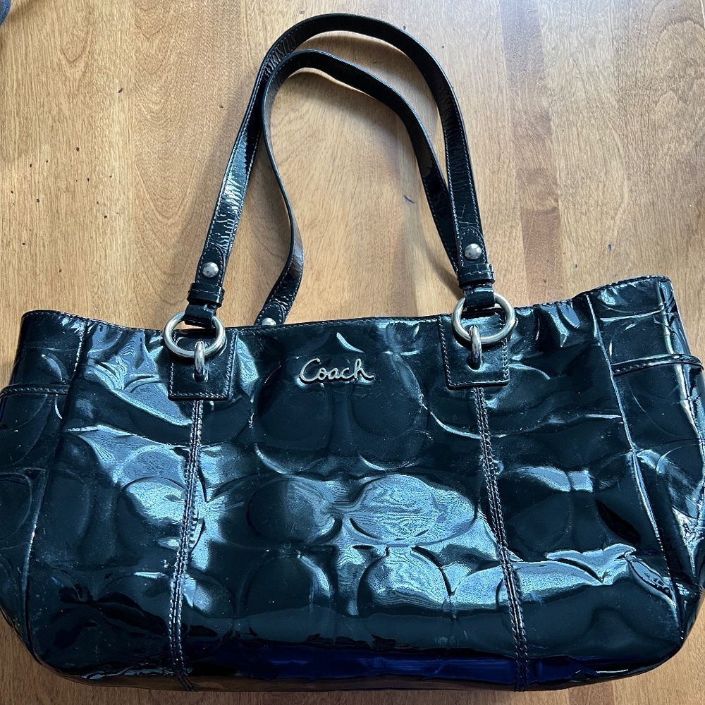 Black patent leather handbag